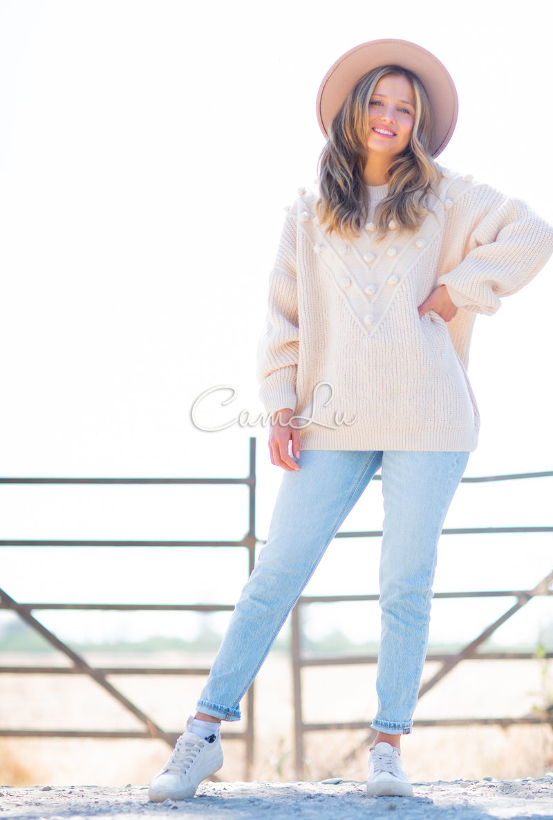 TEJIDO POMPONES FRONTALES (Beige)