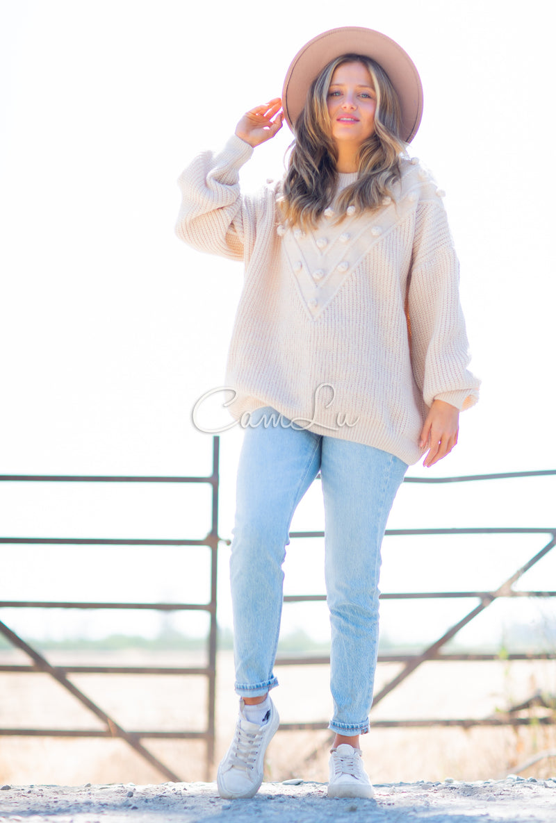 TEJIDO POMPONES FRONTALES (Beige)