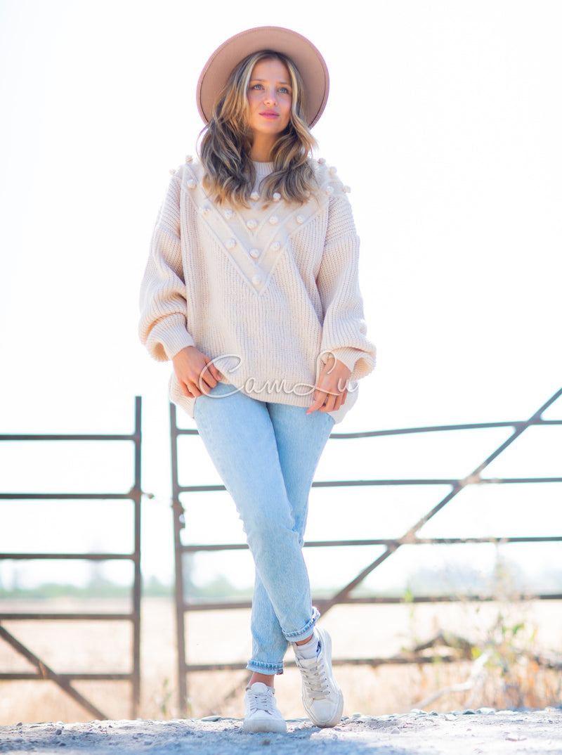 TEJIDO POMPONES FRONTALES (Beige)